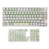 Gamakay 132 Keys Green & White Keycaps Set displayed on a mechanical keyboard, with additional keycaps arranged below. The keycaps feature a playful design with green and white colors, including cute illustrations suitable for girls and those who prefer a