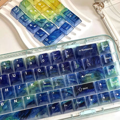 Close-up detail of Gamakay Transparent Starry Sky PC keycaps, showcasing the glossy texture and layered color
